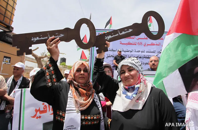 Palestinians wave national flags on May 15, 2016 in Gaza city during a rally to commemorate the "Nakba" or "catastrophe" in Arabic in reference to the establishment in 1948 of the state of Israel. "Nakba" means in Arabic...