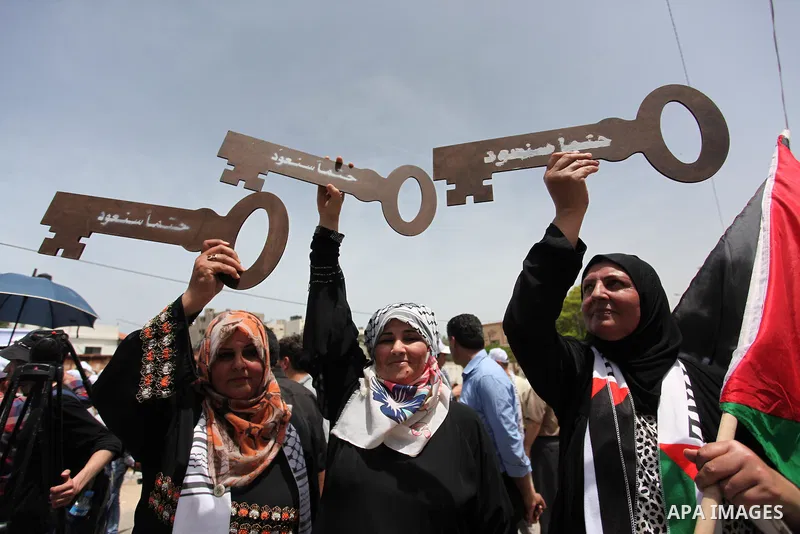 Palestinians wave national flags on May 15, 2016 in Gaza city during a rally to commemorate the "Nakba" or "catastrophe" in Arabic in reference to the establishment in 1948 of the state of Israel. "Nakba" means in Arabic...