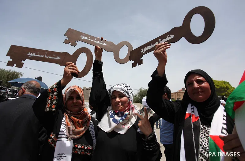 Palestinians wave national flags on May 15, 2016 in Gaza city during a rally to commemorate the "Nakba" or "catastrophe" in Arabic in reference to the establishment in 1948 of the state of Israel. "Nakba" means in Arabic...
