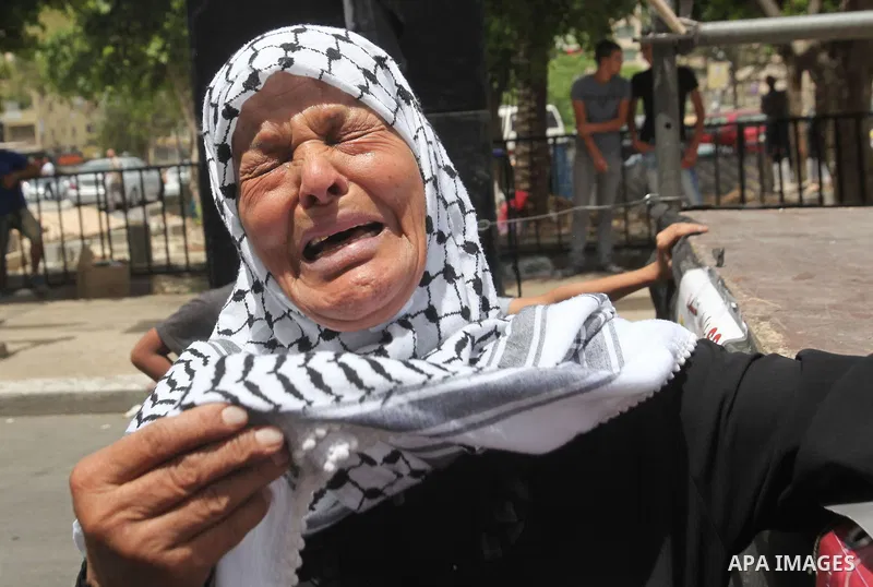 Palestinians wave national flags on May 15, 2016 in the West Bank city of Nablus during a rally to commemorate the "Nakba" or "catastrophe" in Arabic in reference to the establishment in 1948 of the state of Israel. "Nak...