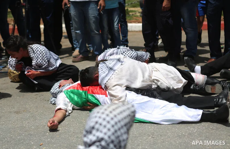 Palestinians re-enact a scene from the 1948 Nakba during a rally marking the 68th anniversary of the Nakba in the West Bank city of Ramallah May 15, 2016. "Nakba" means in Arabic "catastrophe" in reference to the birth o...