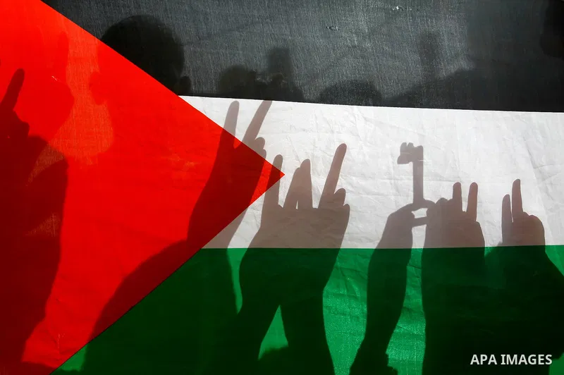 Palestinian children flash victory sign on the 68th anniversary of the "Nakba" in al-Fawar Palestinian refugee camp, south of the West Bank city of Hebron on May 15, 2016. "Nakba" means in Arabic "catastrophe" in referen...