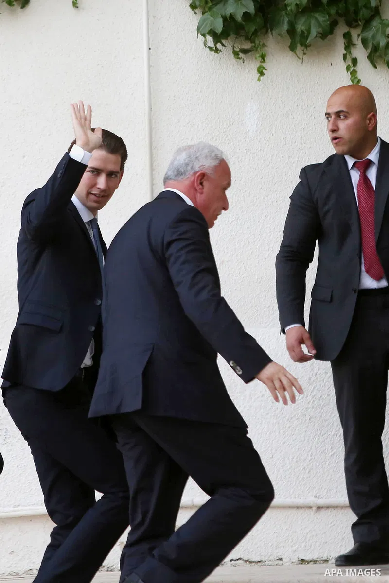 Austrian Foreign Minister Sebastian Kurz waves to media as he arrives to meet Palestinian President Mahmoud Abbas in the West Bank city of Ramallah May 15, 2016. Photo by Shadi Hatem
