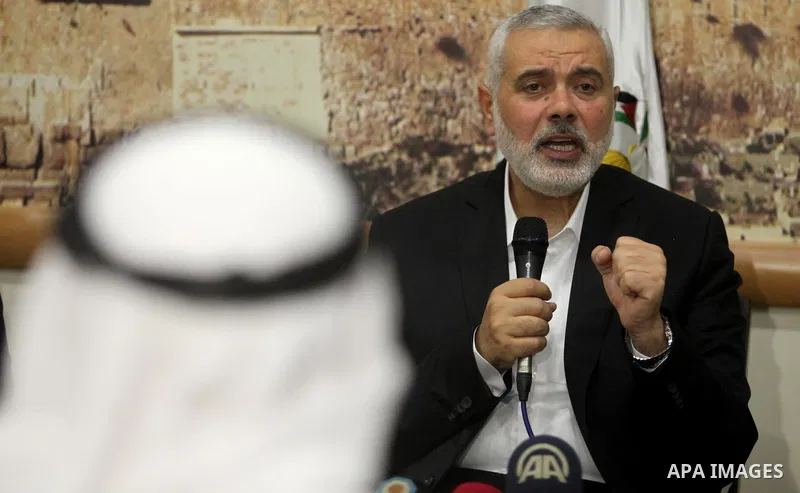 Senior Hamas leader Ismail Haniyeh, speaks during a meeting with Gaza Strip's notables in Gaza city, on May 17, 2016. Photo by Ashraf Amra