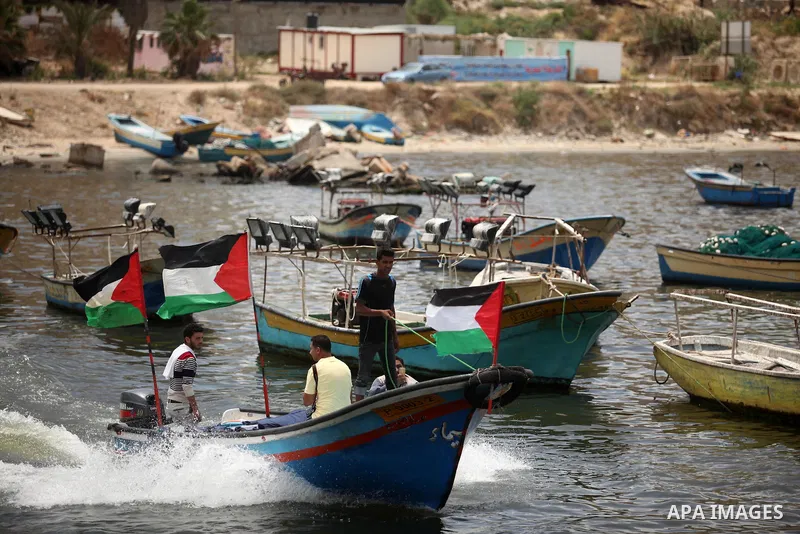 Palestinian patients take part during a protest demanding for treatment abroad, at the Seaport of Gaza City on May 18, 2016. Photo by Ashraf Amra