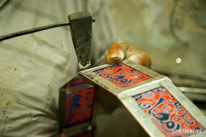 An Egyptian worker manufactures a traditional Ramadan lantern known as "Fanous" in Arabic, at his workshop ready for the month of holy Ramadan in cairo, Egypt, on May 18, 2016. Photo by Amr Sayed