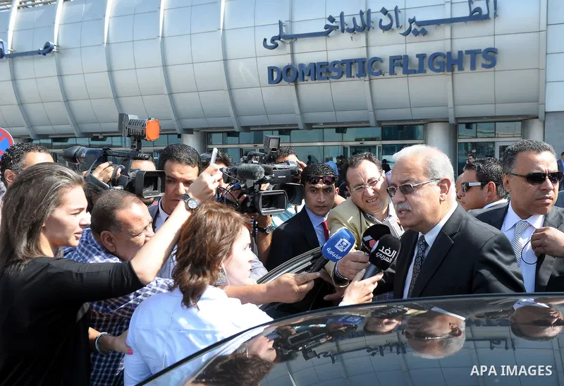 Egyptian Prime Minister Sherif Ismail (R) speaks to reporters after arriving at airport to follow up the incident of the missing EgyptAir flight MS804, Cairo, Egypt, 19 May 2016. According to media reports quoting EgyptA...