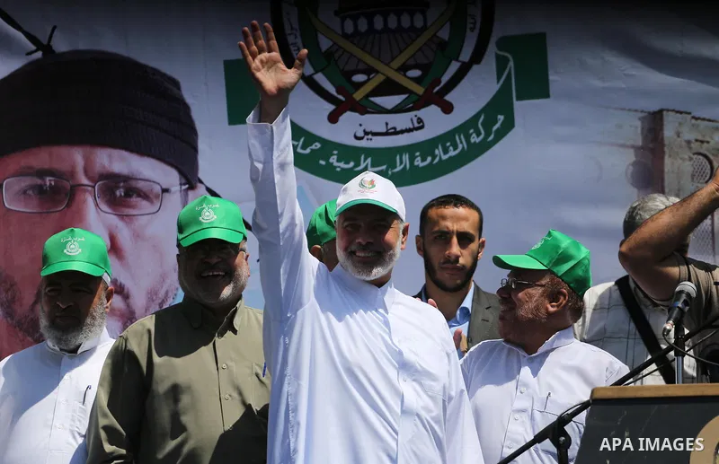 The head of the Islamist Palestinian movement Hamas, Ismail Haniya, takes part during a rally to commemorate the 68th anniversary of the "Nakba" or "catastrophe" in Arabic in reference to the establishment in 1948 of the...