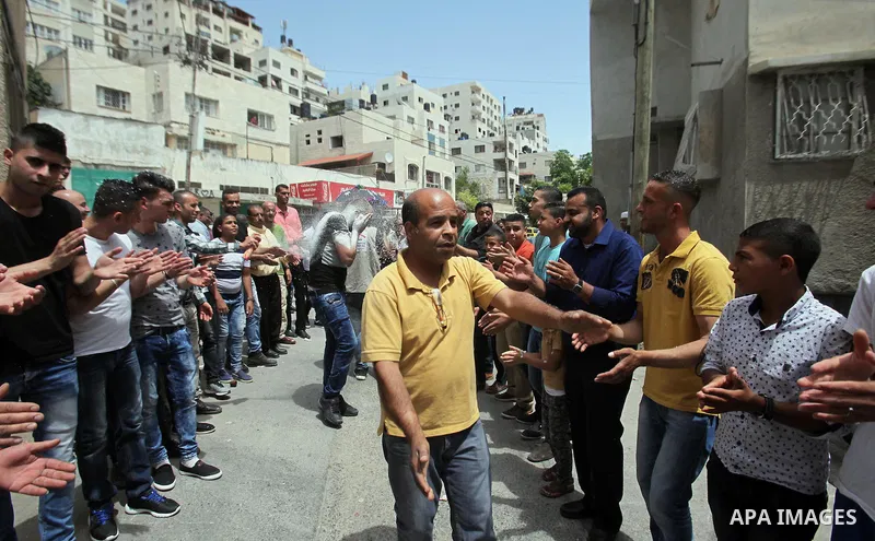 Palestinian friends and relatives celebrated the groom, Mahran Abu Rish, in the West Bank city of Nablus on the eve of his wedding on May 21, 2016, during the traditional celebration, Abu Rish, was first taken by relativ...