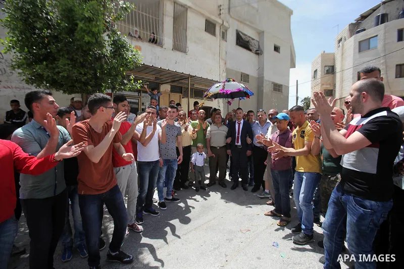 Palestinian friends and relatives celebrated the groom, Mahran Abu Rish, in the West Bank city of Nablus on the eve of his wedding on May 21, 2016, during the traditional celebration, Abu Rish, was first taken by relativ...