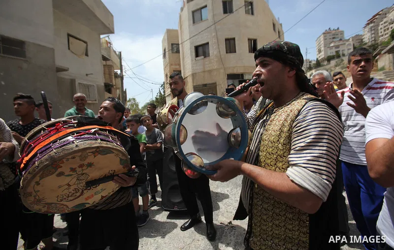 Palestinian friends and relatives celebrated the groom, Mahran Abu Rish, in the West Bank city of Nablus on the eve of his wedding on May 21, 2016, during the traditional celebration, Abu Rish, was first taken by relativ...