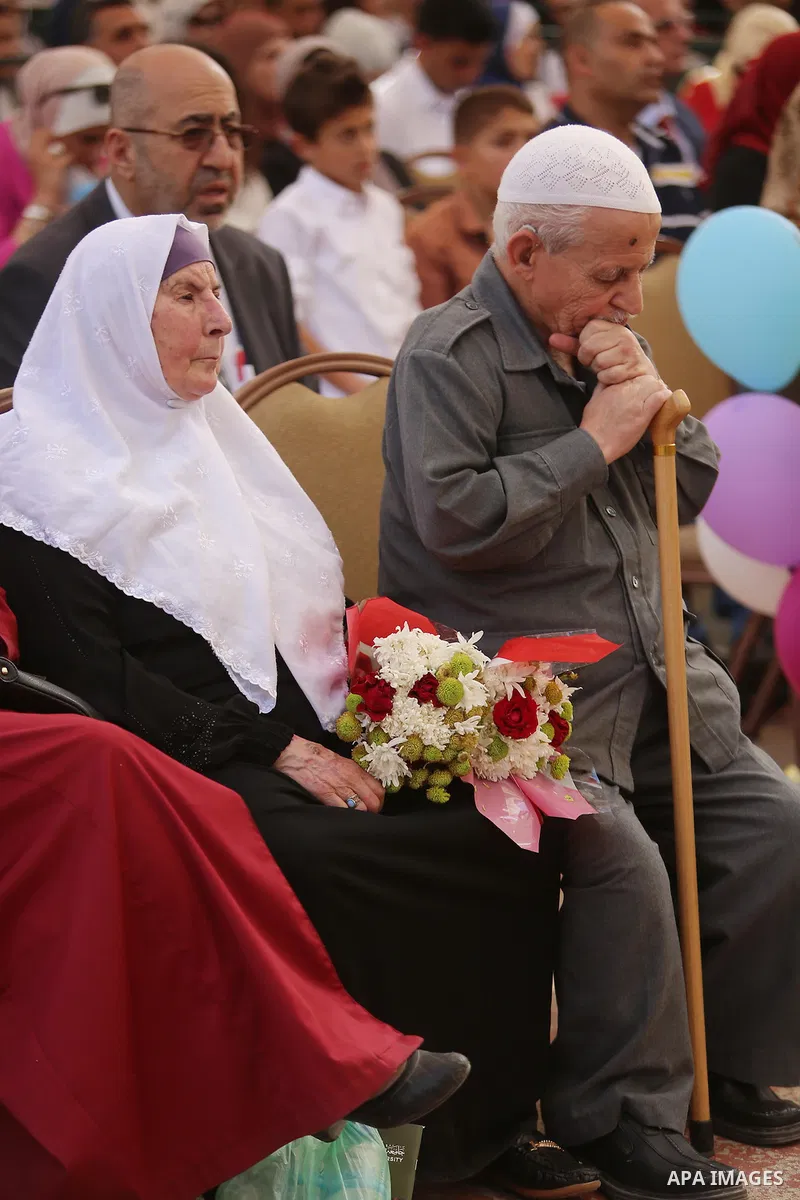 Palestinian students attend their graduation ceremony at the end of the academic year on May 21, 2016 at Birzeit University in the West Bank town of Birzeit, near Ramallah. Photo by Shadi Hatem