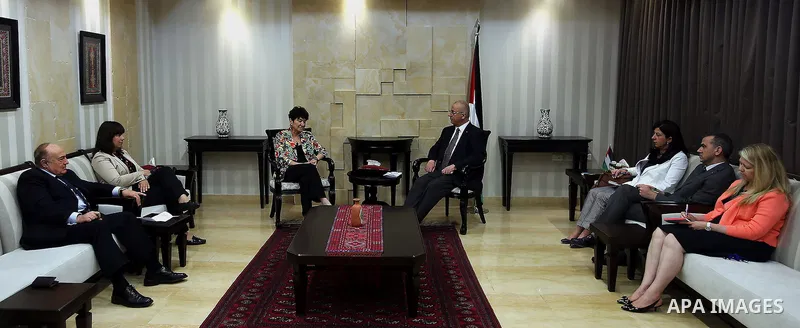 Palestinian Prime Minister, Rami Hamdallah, meets with a delegation from the European Bank, in the West Bank city of Ramallah, on May 23, 2016. Photo by Prime Minister Office