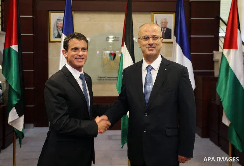 Palestinian Prime Minister, Rami Hamdallah, meets with French Prime Minister Manuel Valls, in the West Bank city of Ramallah, on May 24, 2016. Photo by Prime Minister Office