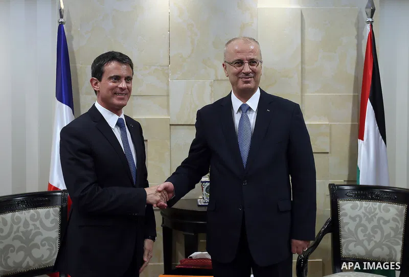 Palestinian Prime Minister, Rami Hamdallah, meets with French Prime Minister Manuel Valls, in the West Bank city of Ramallah, on May 24, 2016. Photo by Prime Minister Office