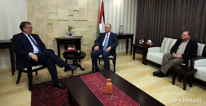 Palestinian Prime Minister Rami Hamdallah meets with representative for the Netherlands to the Palestinian Authority Peter Mollema, in the West Bank city of Ramallah, on May 25, 2016. Photo by Prime Minister Office