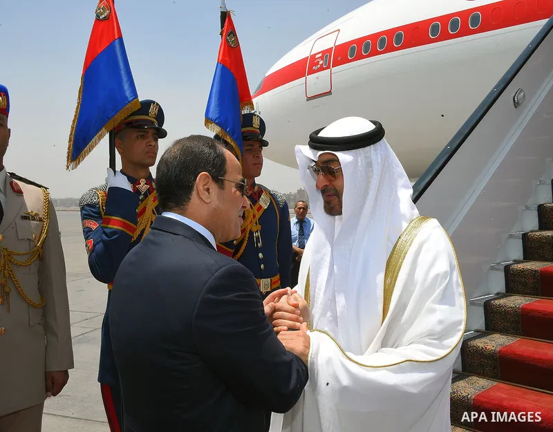 Egyptian President Abdel Fattah al-Sisi welcomes Crown Prince of Abu Dhabi Sheikh Mohammed bin Zayed al-Nahyan upon his arrival at Cairo's international airport in Cairo, Egypt, on May 25, 2016. Photo by Egyptian Preside...