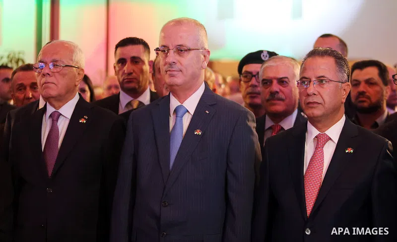 Palestinian Prime Minister Rami Hamdallah attends a ceremony on 70th anniversary of the independence the Hashemite Kingdom of Jordan, in the West Bank city of Ramallah, on May 25, 2016. Photo by Prime Minister Office