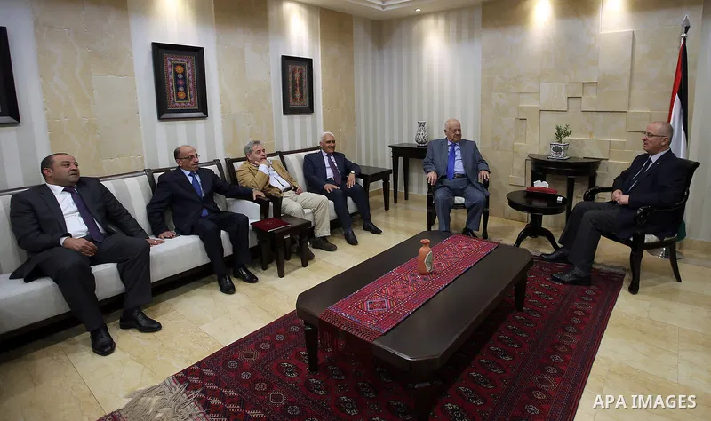 Palestinian Prime Minister, Rami Hamdallah, receives the Annual report of the Anti-Corruption Commission for 2015 in the West Bank city of Ramallah on May 26 , 2016.Photo by Prime Minister Office