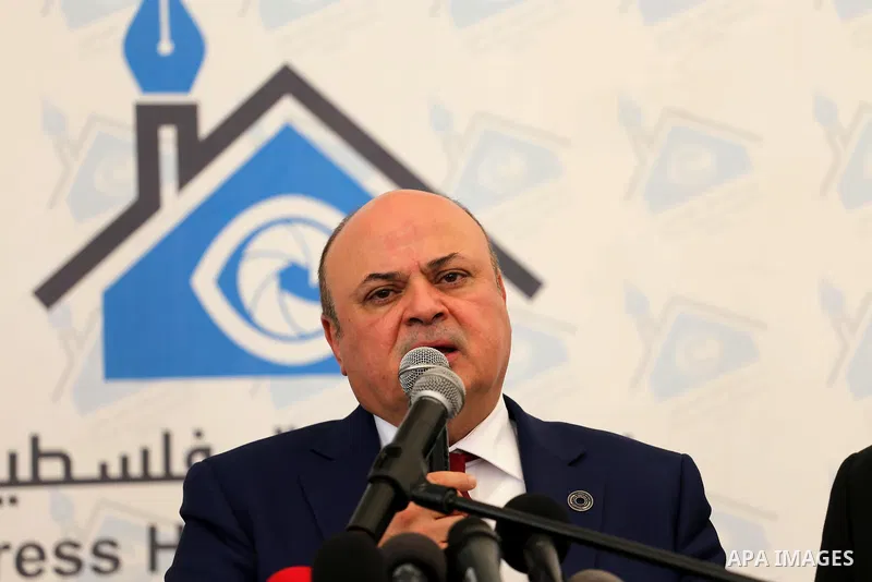 Azzam Shawwa, Governor of the Palestinian Monetary Authority, speaks during a press conference in Gaza city, on May 26, 2016. Photo by Mohammed Asad