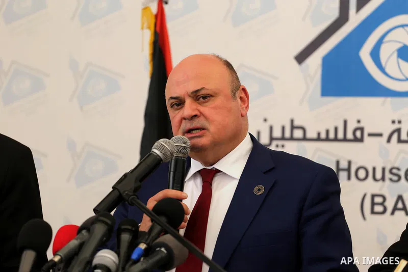 Azzam Shawwa, Governor of the Palestinian Monetary Authority, speaks during a press conference in Gaza city, on May 26, 2016. Photo by Mohammed Asad