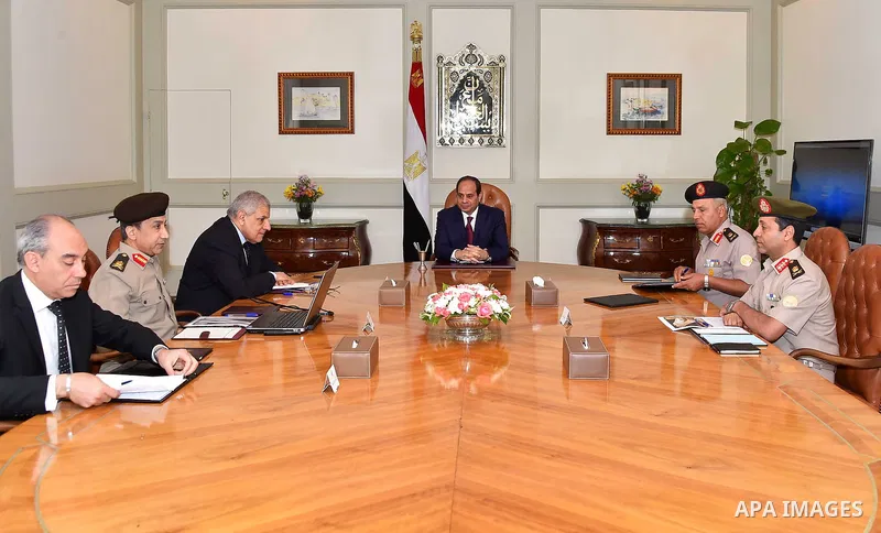 Egyptian President Abdel Fattah al-Sisi meets with Ibrahim Mahlab, presidential adviser for national projects, in Cairo, Egypt, on May 26, 2016. Photo by Egyptian President Office