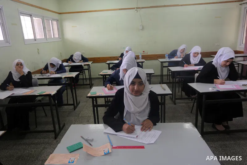 Palestinian female students sit for their final high school exams, known as "Tawjihi", in Gaza city on May 28, 2016. Nearly 78,000 Palestinian students sat for the first session of their high school exams seeking to obta...
