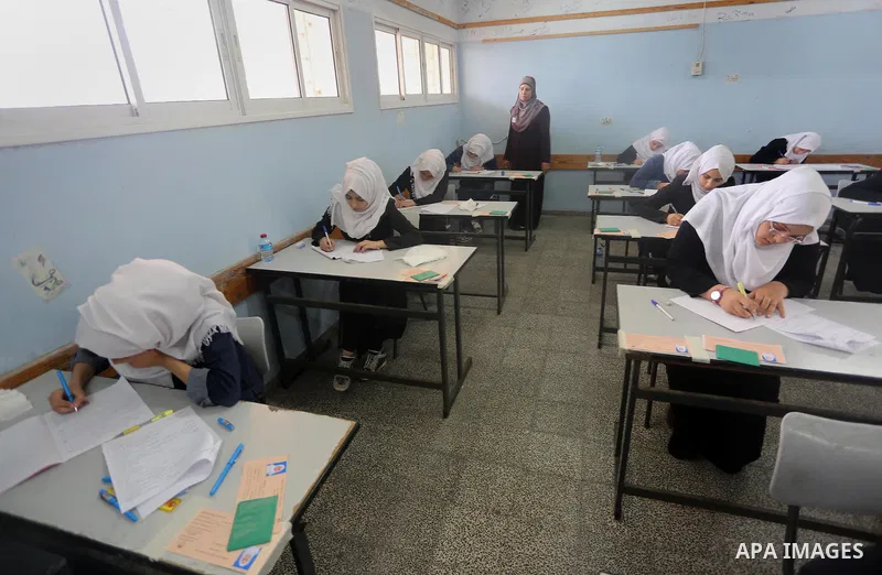 Palestinian female students sit for their final high school exams, known as "Tawjihi", in Gaza city on May 28, 2016. Nearly 78,000 Palestinian students sat for the first session of their high school exams seeking to obta...