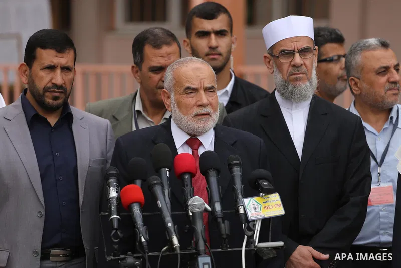 Deputy of the Legislative Council, Ahmed Bahar, speaks during a press conference during the first day of high school exams, known as "Tawjihi", in Gaza city on May 28, 2016. Nearly 78,000 Palestinian students sat for the...