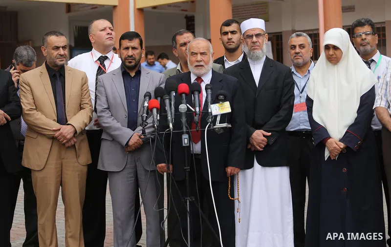 Deputy of the Legislative Council, Ahmed Bahar, speaks during a press conference during the first day of high school exams, known as "Tawjihi", in Gaza city on May 28, 2016. Nearly 78,000 Palestinian students sat for the...