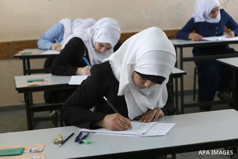 Palestinian female students sit for their final high school exams, known as "Tawjihi", in Gaza city on May 28, 2016. Nearly 78,000 Palestinian students sat for the first session of their high school exams seeking to obta...