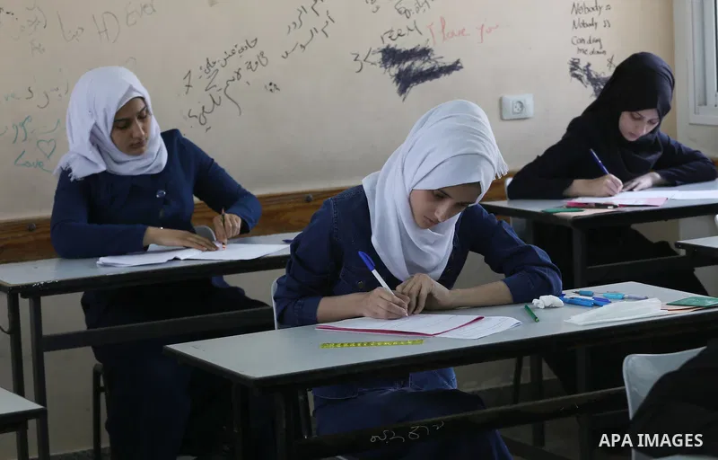 Palestinian female students sit for their final high school exams, known as "Tawjihi", in Gaza city on May 28, 2016. Nearly 78,000 Palestinian students sat for the first session of their high school exams seeking to obta...