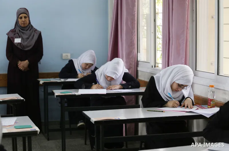 Palestinian female students sit for their final high school exams, known as "Tawjihi", in Gaza city on May 28, 2016. Nearly 78,000 Palestinian students sat for the first session of their high school exams seeking to obta...