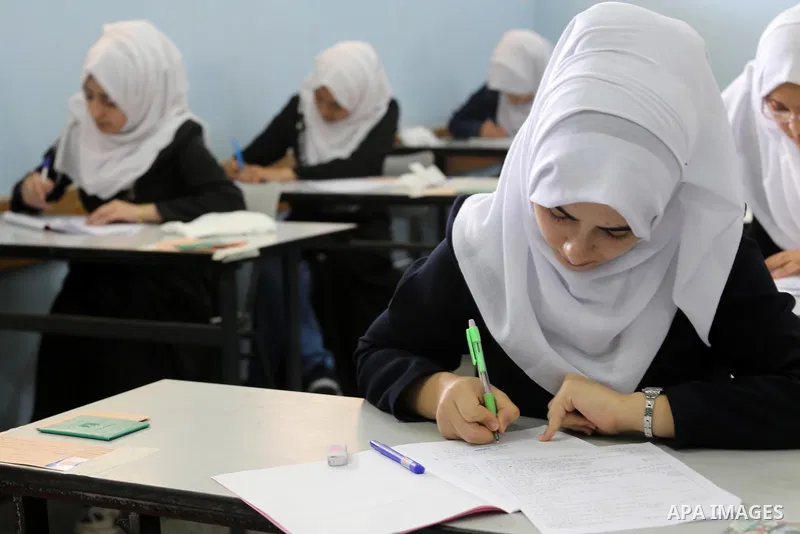 Palestinian female students sit for their final high school exams, known as "Tawjihi", in Gaza city on May 28, 2016. Nearly 78,000 Palestinian students sat for the first session of their high school exams seeking to obta...