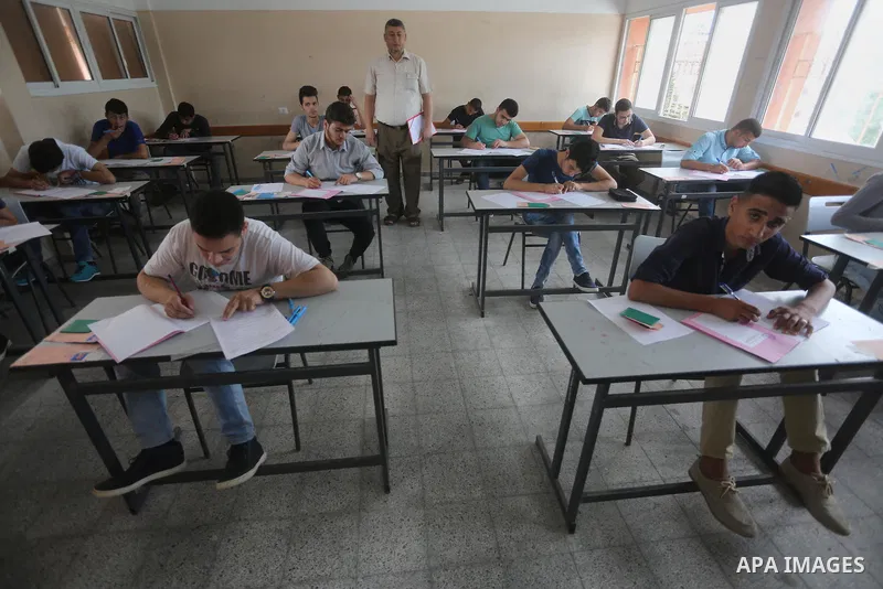 Palestinian students sit for their final high school exams, known as "Tawjihi", in Gaza city on May 28, 2016. Nearly 78,000 Palestinian students sat for the first session of their high school exams seeking to obtain the...