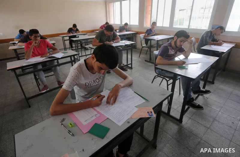 Palestinian students sit for their final high school exams, known as "Tawjihi", in Gaza city on May 28, 2016. Nearly 78,000 Palestinian students sat for the first session of their high school exams seeking to obtain the...