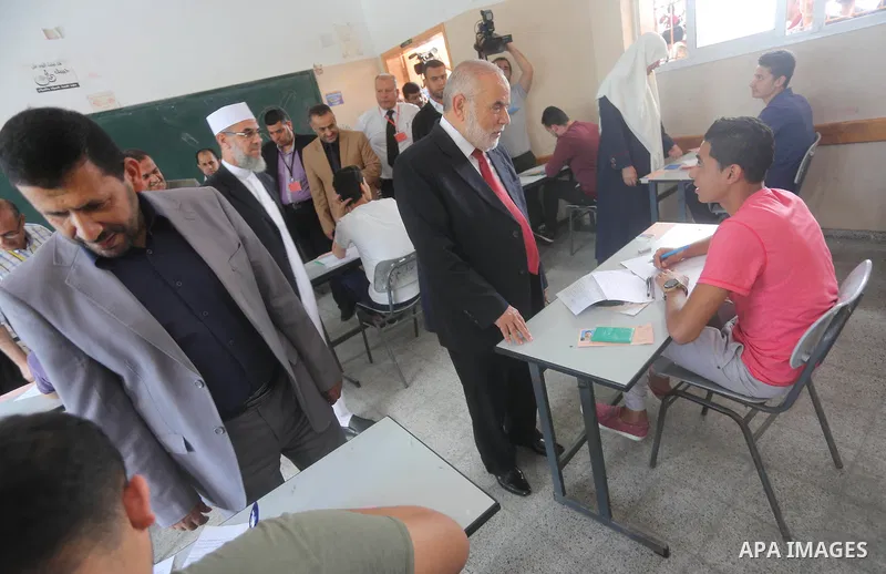 Deputy of the Legislative Council, Ahmed Bahar, visits a school during the first day of high school exams, known as "Tawjihi", in Gaza city on May 28, 2016. Nearly 78,000 Palestinian students sat for the first session of...