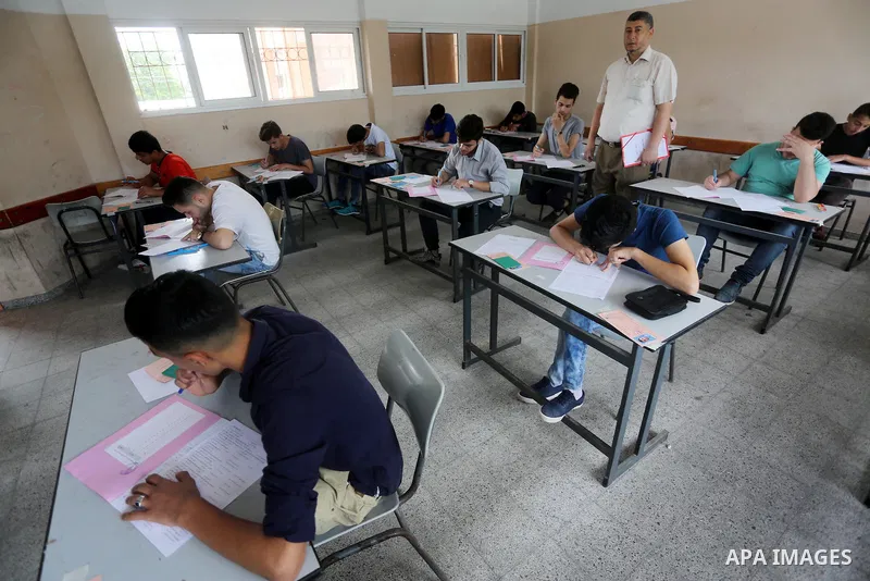 Palestinian students sit for their final high school exams, known as "Tawjihi", in Gaza city on May 28, 2016. Nearly 78,000 Palestinian students sat for the first session of their high school exams seeking to obtain the...