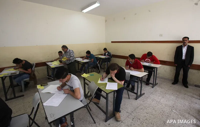 Palestinian students sit for their final high school exams, known as "Tawjihi", in the West bank city of Nablus on May 28, 2016. Nearly 78,000 Palestinian students sat for the first session of their high school exams see...