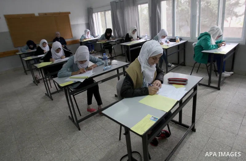 Palestinian students sit for their final high school exams, known as "Tawjihi", in the West bank city of Nablus on May 28, 2016. Nearly 78,000 Palestinian students sat for the first session of their high school exams see...