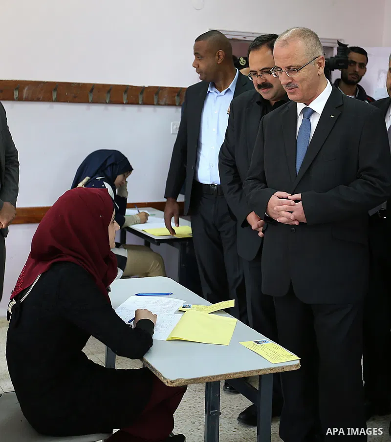 Palestinian Prime Minister Rami Hamdallah visits a school during the first day of high school exams, known as "Tawjihi",In Jerusalem, on May 28, 2016. Nearly 78,000 Palestinian students sat for the first session of their...