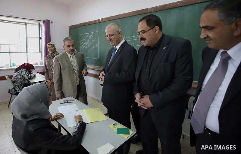 Palestinian Prime Minister Rami Hamdallah visits a school during the first day of high school exams, known as "Tawjihi",In Jerusalem, on May 28, 2016. Nearly 78,000 Palestinian students sat for the first session of their...
