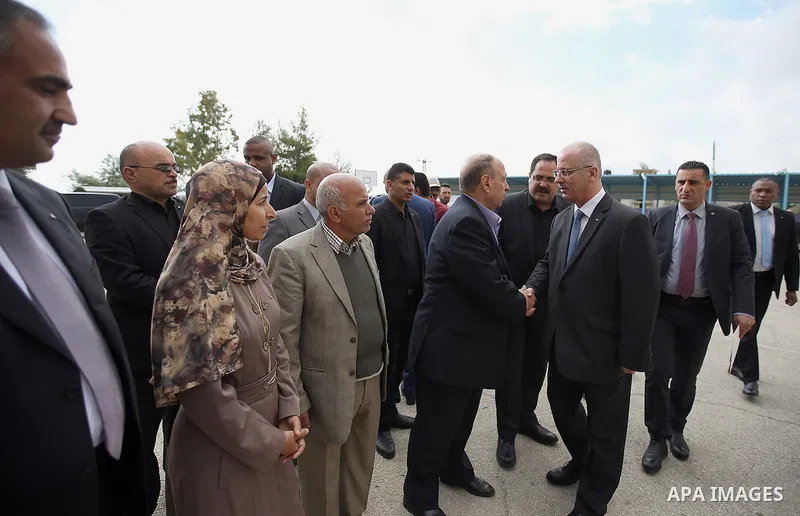 Palestinian Prime Minister Rami Hamdallah visits a school during the first day of high school exams, known as "Tawjihi",In Jerusalem, on May 28, 2016. Nearly 78,000 Palestinian students sat for the first session of their...