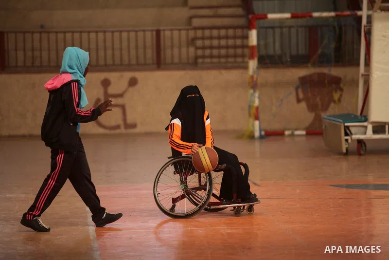 Disabled Palestinians take part in a training course to play basketball organised by the Palestinian Red Cross, in Khan Younis in the southern Gaza strip, on May 28, 2016. Photo by Ashraf Amra