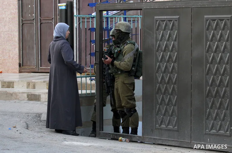 Israeli soldiers patrol a street, at Salem village near the West Bank city of Nablus, on May 30, 2016. Photo by Nedal Eshtayah