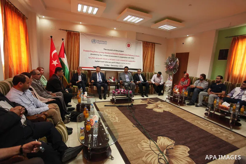 Turkish Consul, Mustafa Sarnic with Gerald Rockenschaub, Head of the WHO office in the occupied Palestinian territories visit al-Shifa hospital in Gaza City, on May 30, 2016. Photo by Ashraf Amra