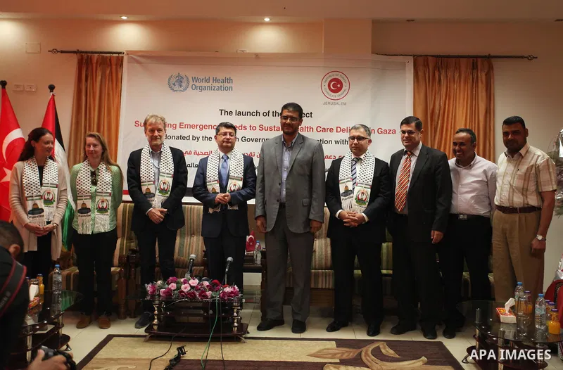 Turkish Consul, Mustafa Sarnic with Gerald Rockenschaub, Head of the WHO office in the occupied Palestinian territories visit al-Shifa hospital in Gaza City, on May 30, 2016. Photo by Ashraf Amra