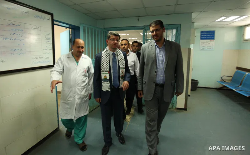 Turkish Consul, Mustafa Sarnic with Gerald Rockenschaub, Head of the WHO office in the occupied Palestinian territories visit al-Shifa hospital in Gaza City, on May 30, 2016. Photo by Ashraf Amra