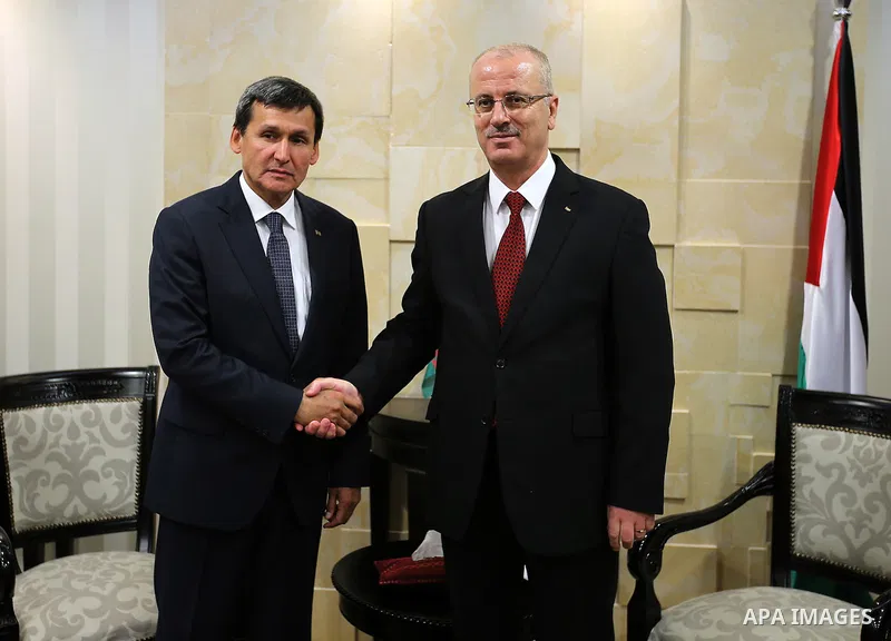 Palestinian Prime Minister Rami Hamdallah meets with Turkmenistan's Foreign Minister Rashid Meredov, in the West Bank city of Ramallah, on May 30, 2016. Photo by Prime Minister Office