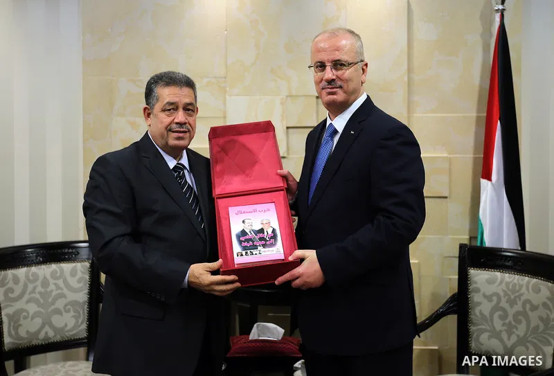 Palestinian Prime Minister Rami Hamdallah meets with Secretary General of the Moroccan independence party Hamid Chabat, in the West Bank city of Ramallah, on May 31, 2016.. Photo by Prime Minister Office